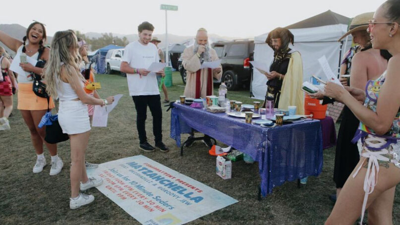 Rapper Kosha Dillz, center, dressed as Moses, leads Passover mini-Seders outside the Shabbat Tent at the Coachella music festival in Indio, California. Dillz refers to the event as Matzahchella. Photo via Instagram/@chrism_arts