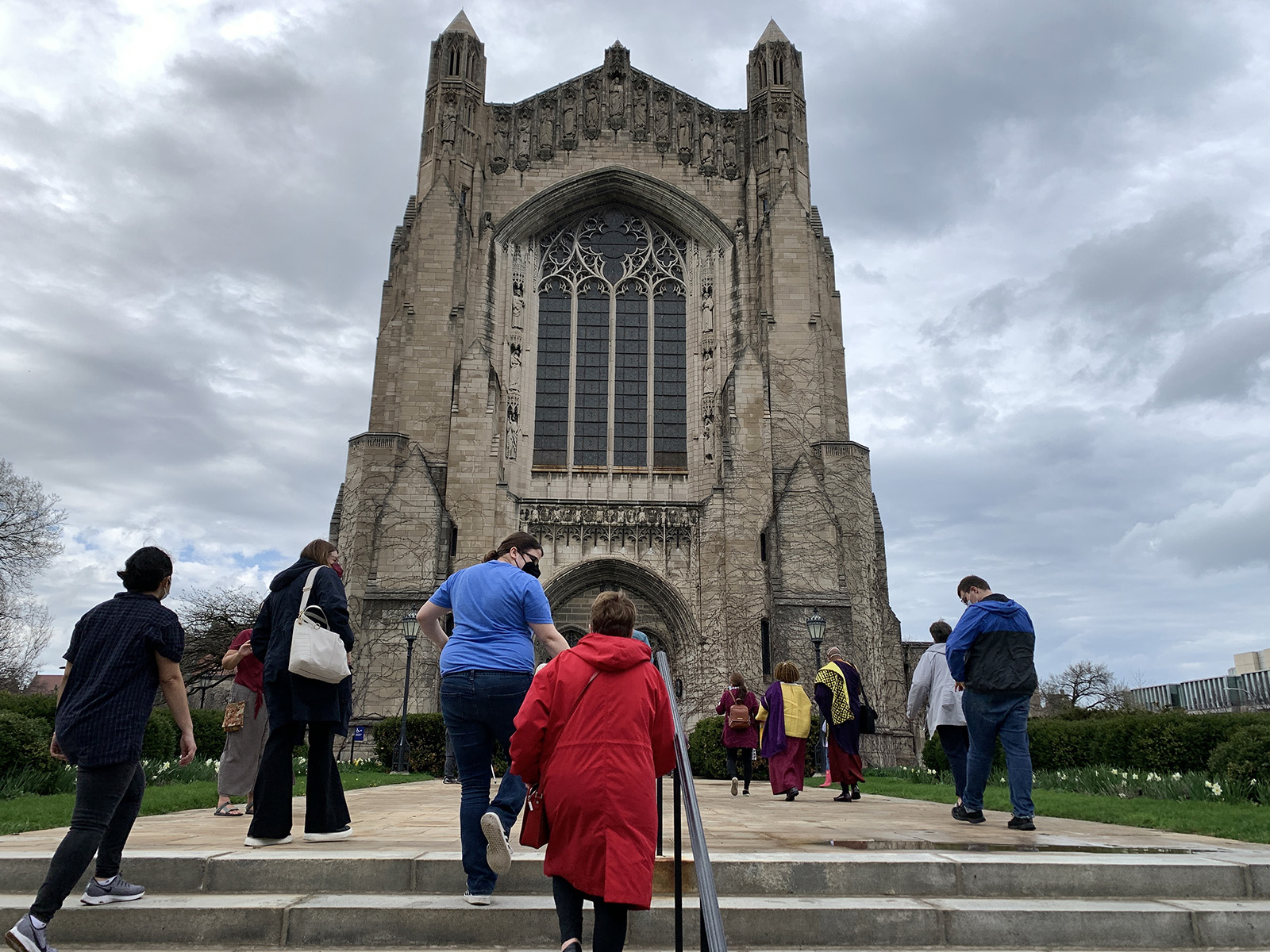 Chicago Interfaith Trolley Tour participants stop at the University of Chicago's Rockefeller Memorial Chapel on Sunday, April 24, 2022. RNS Photo by Bob Smietana
