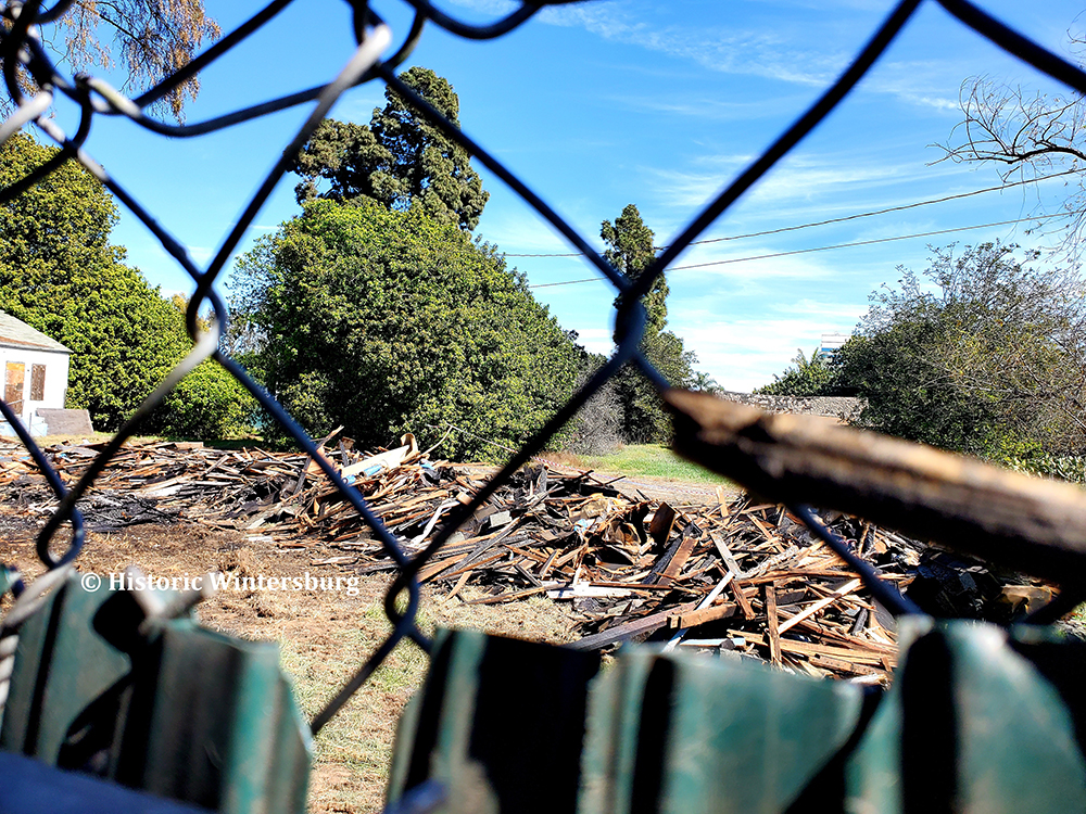 The demolished remains of the 1910 Wintersburg Japanese Mission and 1910 Manse two days after the fire, on Feb. 27, 2022, in Huntington Beach, California. (Photo © Mary Adams Urashima All Rights Reserved.)