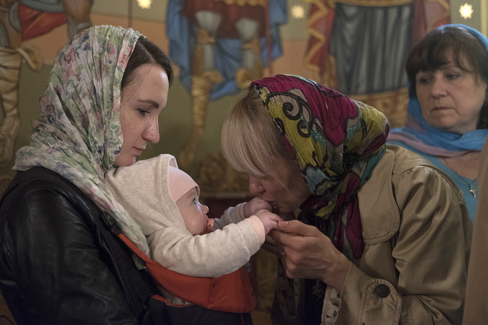 The majority of people that participated in the Easter Mass were Ukrainian mothers with children who fled the war into Romania and found a temporary home in Bucharest. RNS photo by Alexandra Radu