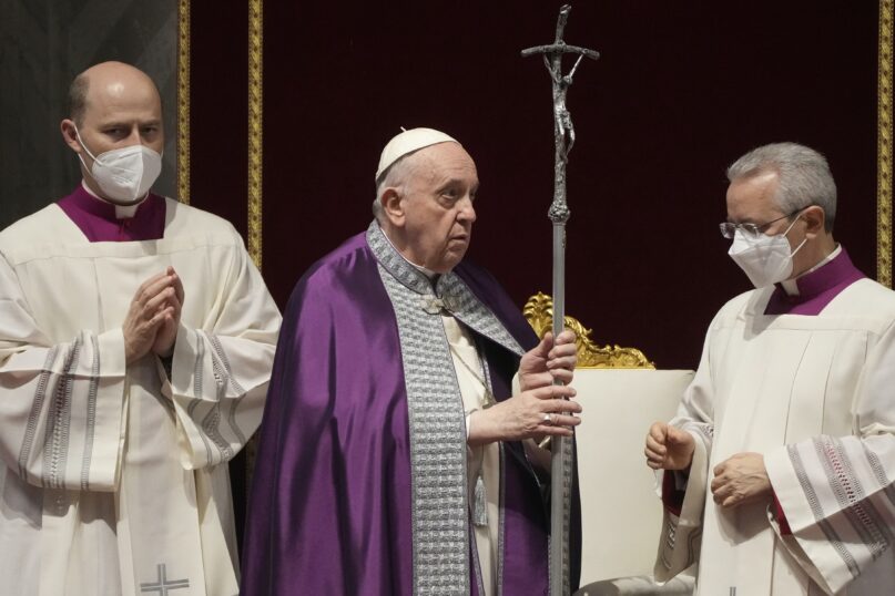 Pope Francis presides over a special prayer in St. Peter's Basilica at the Vatican on March 25, 2022, before heading out to Malta for a two-day visit. (AP Photo/Gregorio Borgia, File)
