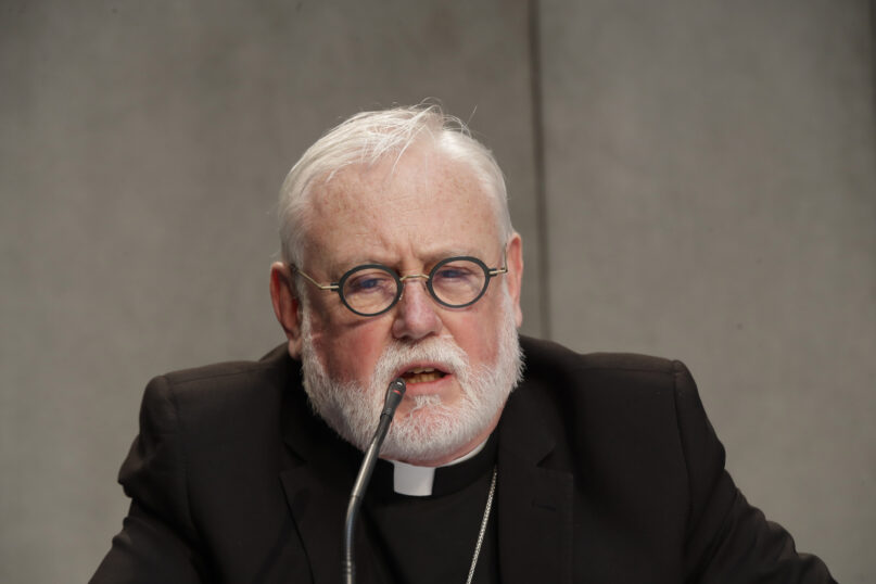 FILE - Vatican Secretary of State Paul Richard Gallagher speaks during a press conference to present a document on the 5th anniversary of Pope Francis' encyclical 