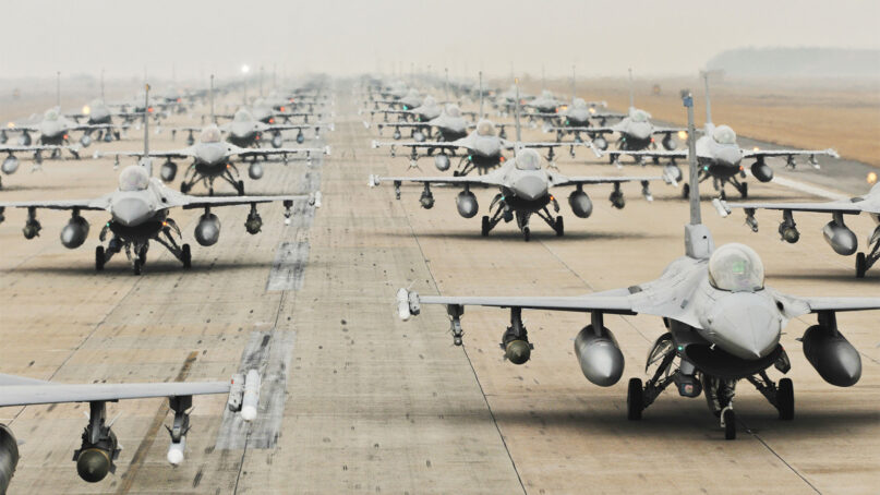 U.S. Air Force F-16 fighter jets in an elephant walk training exercise demonstration in 2017. Photo courtesy of PxHere/Creative Commons