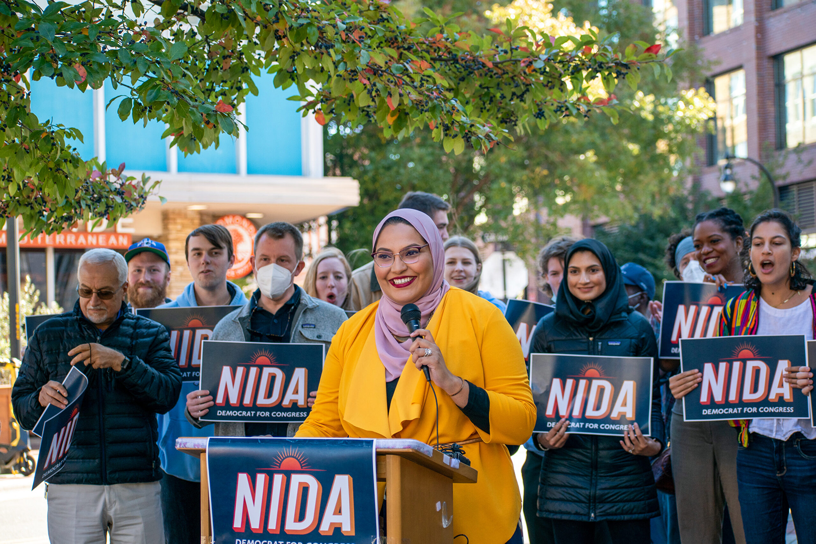 Nida Allam, center, campaigns in Nov. 2021, in North Carolina. Photo by Elijah J. Mears via NidaAllam.com