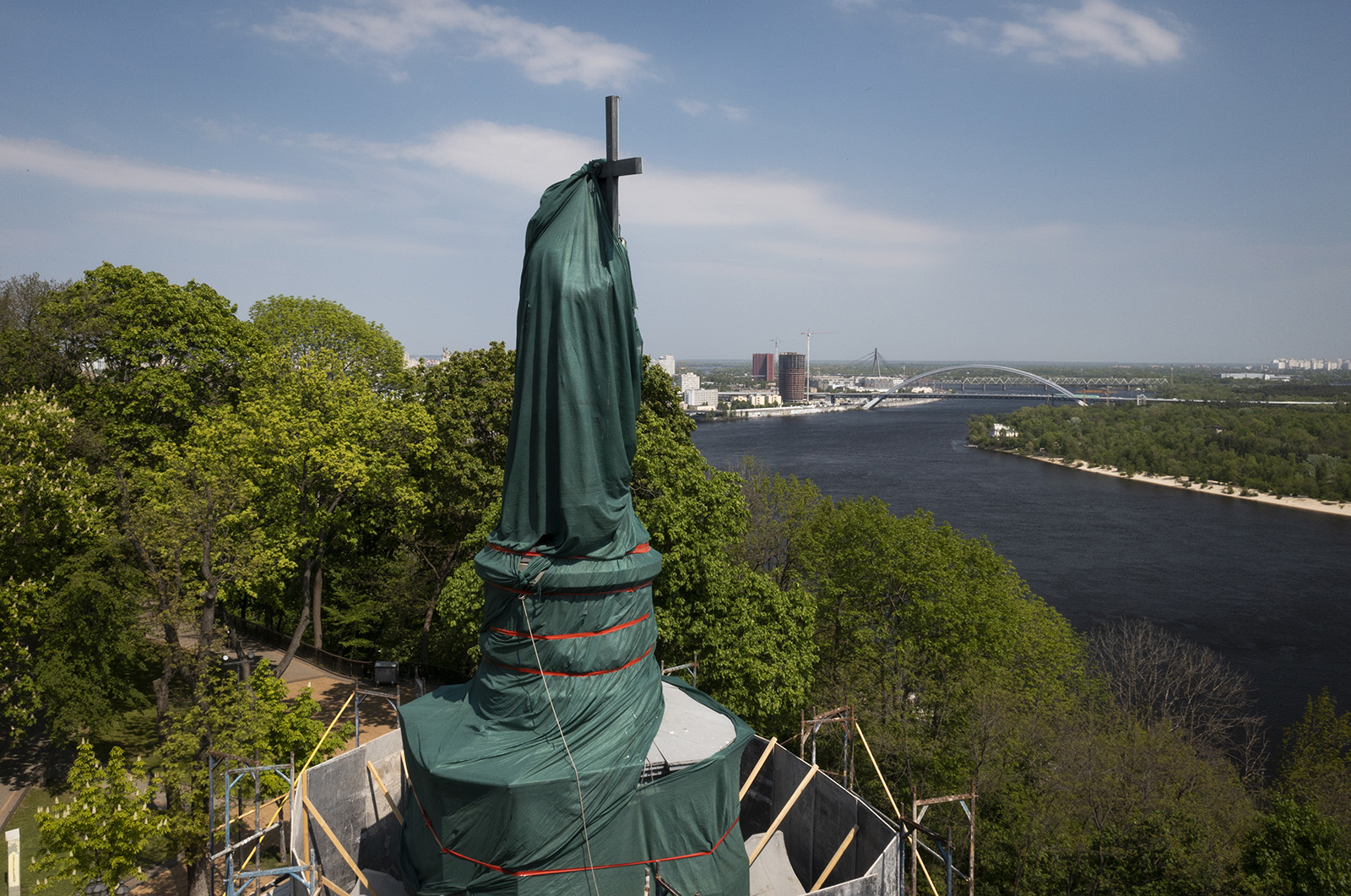 A early 200-year-old monument to legendary Prince Volodymyr, a Kyiv landmark and one of the symbols of the Ukrainian capital, is wrapped to protect it from Russian shelling in Kyiv, Ukraine, Thursday, May 12, 2022. (AP Photo/Efrem Lukatsky)