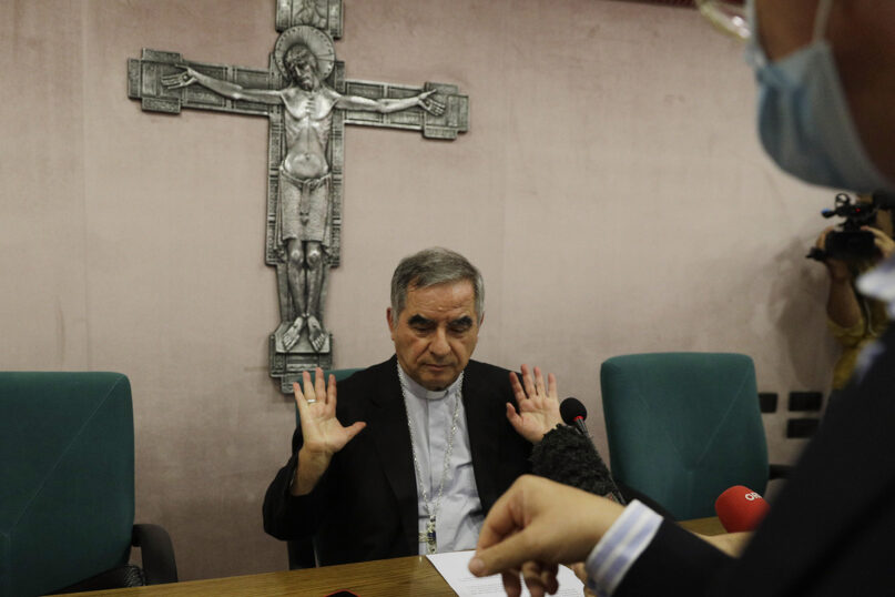 Cardinal Angelo Becciu talks to journalists during a news conference in Rome, in this Sept. 25, 2020, file photo. (AP Photo/Gregorio Borgia)