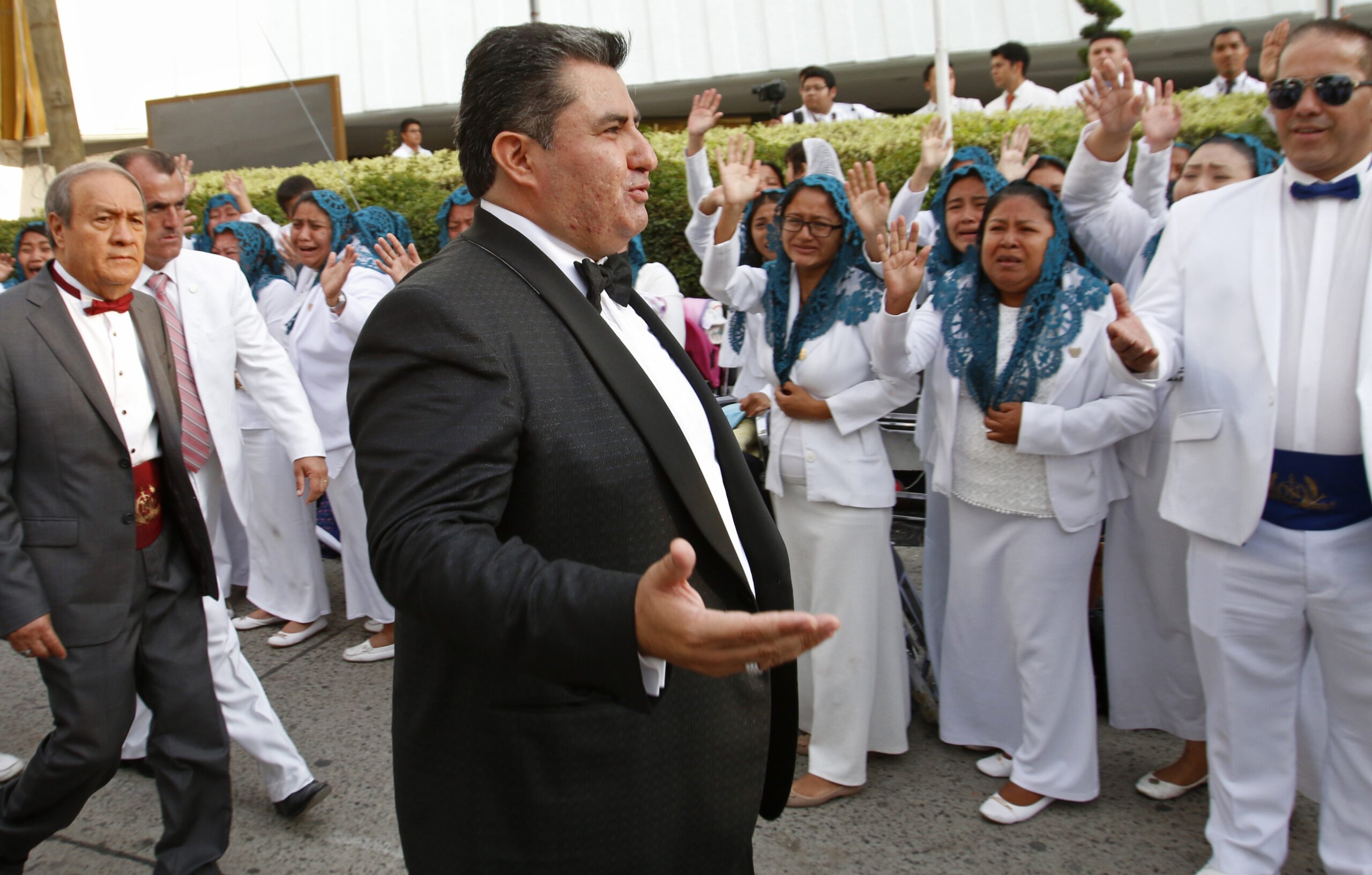 Naasón Joaquín García greets members of his church, La Luz del Mundo, in Guadalajara, Mexico, on Aug. 14, 2018. García pleaded guilty June 3, 2022, to sexually abusing three girls, California state prosecutors said. (AP Photo/File)