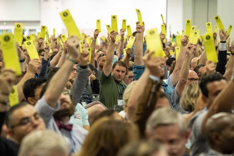 Messengers vote to pass the second recommendation from the SBC sexual abuse task force during the Southern Baptist Convention annual meeting at the Anaheim Convention Center in Anaheim, California, on Tuesday, June 14, 2022.  Photo by Justin L. Stewart/Religion News Service