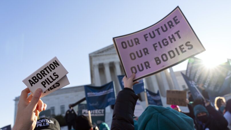 Abortion rights advocates demonstrate in front of the U.S. Supreme Court in 2021, in Washington, D.C. (AP Photo/Jose Luis Magana)
