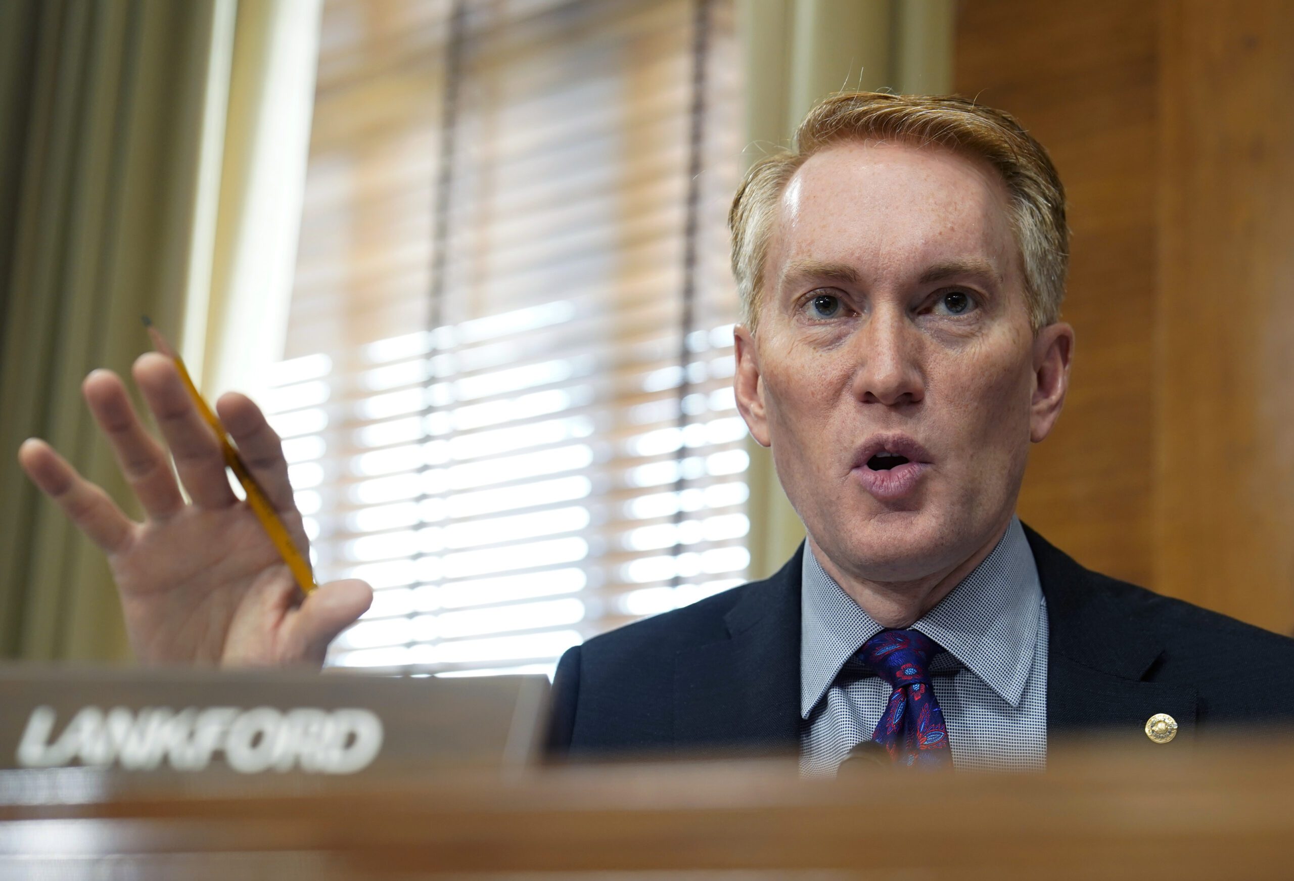 FILE - Sen. James Lankford, R-Okla., speaks during a Senate Energy and Natural Resources Committee hearing May 19, 2022, on Capitol Hill in Washington. Before Lankford became a leading voice for conservative causes on Capitol Hill, he spent more than a decade as the director of youth programming at the Falls Creek Baptist Conference Center, a sprawling campground about 80 miles south of Oklahoma City that attracts more than 50,000 campers in grades six through 12 each year. (AP Photo/Mariam Zuhaib, File)