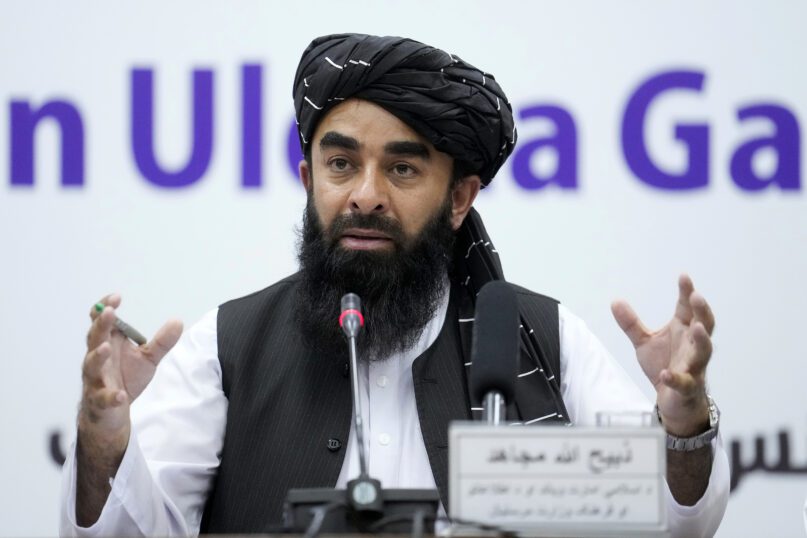 Zabiullah Mujahid, the spokesman for the Taliban government, speaks during a press conference in Kabul, Afghanistan, Thursday, June 30, 2022. Afghanistan’s Taliban rulers on Thursday held the first major gathering of Islamic clerics and tribal elders since they seized power in August, with over 3,000 coming to the capital for the event.  Women were not allowed to attend. (AP Photo/Ebrahim Noroozi)
