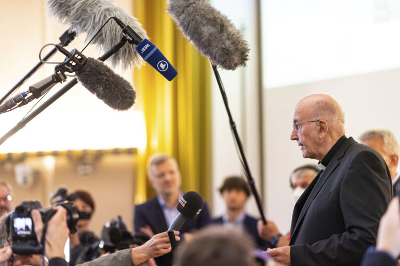 After the press conference to present the results of the study on abuse in the Diocese of Muenster, Felix Genn, Bishop of M'nster speaks to the press in Muenster, Germany, Monday, June 13, 2022. In the Westphalian Wilhelms University, the research team presents the study results from the abuse from 1945 - 2020 in the diocese of Muenster. (Guido Kirchner/dpa/ via AP)