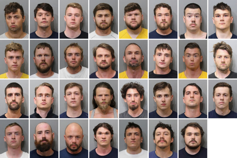These booking images provided by the Kootenai County Sheriff’s Office show the 31 members of the white supremacist group Patriot Front who were arrested after they were found packed into the back of a U-Haul truck with riot gear near an LGBTQ Pride event in Coeur d’Alene, Idaho, on June 11, 2022. Top row, from left, are Jared Boyce, Nathan Brenner, Colton Brown, Josiah Buster, Mishael Buster, Devin Center, Dylan Corio and Winston Durham. Second row, from left, are Garret Garland, Branden Haney, Richard Jessop, James Julius Johnson, James Michael Johnson, Connor Moran, Kieran Morris and Lawrence Norman. Third row, from left, are Justin O'leary, Cameron Pruitt, Forrest Rankin, Thomas Rousseau, Conor Ryan, Spencer Simpson, Alexander Sisenstein and Derek Smith. Bottom row, from left, are Dakota Tabler, Steven Tucker, Wesley Van Horn, Mitchell Wagner, Nathaniel Whitfield, Graham Whitsom and Robert Whitted. (Kootenai County Sheriff’s Office via AP)