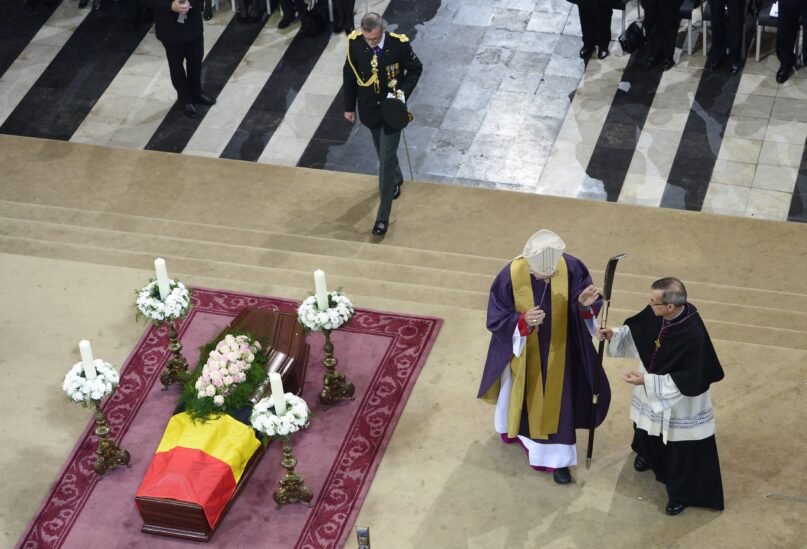 Ghent Bishop Luc Van Looy, center, presides over the funeral service of former Belgian prime minister Wilfried Martens at the Saint-Bavo's Cathedral in Ghent, Belgium on Saturday, Oct. 19, 2013. (AP Photo/Yorrick Jansens, Pool, File)