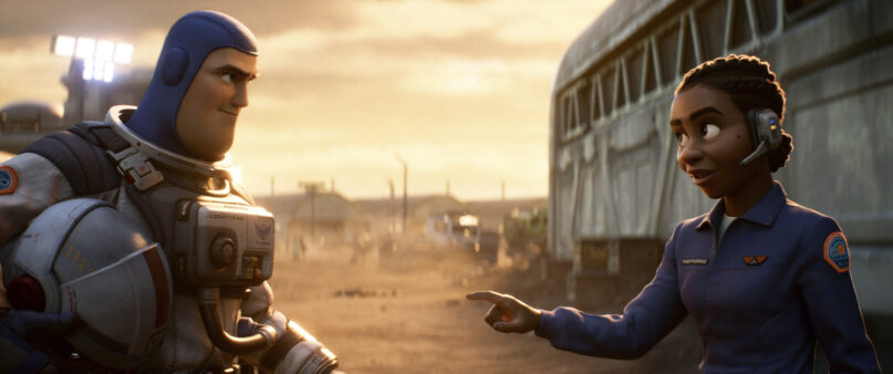 FILE - This image released by Disney/Pixar shows character Buzz Lightyear, voiced by Chris Evans, left, and Alisha Hawthorne, voiced by Uzo Aduba, in a scene from the animated film 