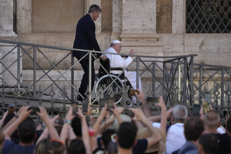 Pope Francis greets the faithful as he leaves St. Mary Major Basilica after participating in a rosary prayer for peace, in Rome, May 31, 2022. Francis canceled a planned July trip to Africa on doctors’ orders because of ongoing knee problems, the Vatican said June 10, 2022, raising further questions about the health and mobility problems of the 85-year-old pontiff. (AP Photo/Gregorio Borgia)