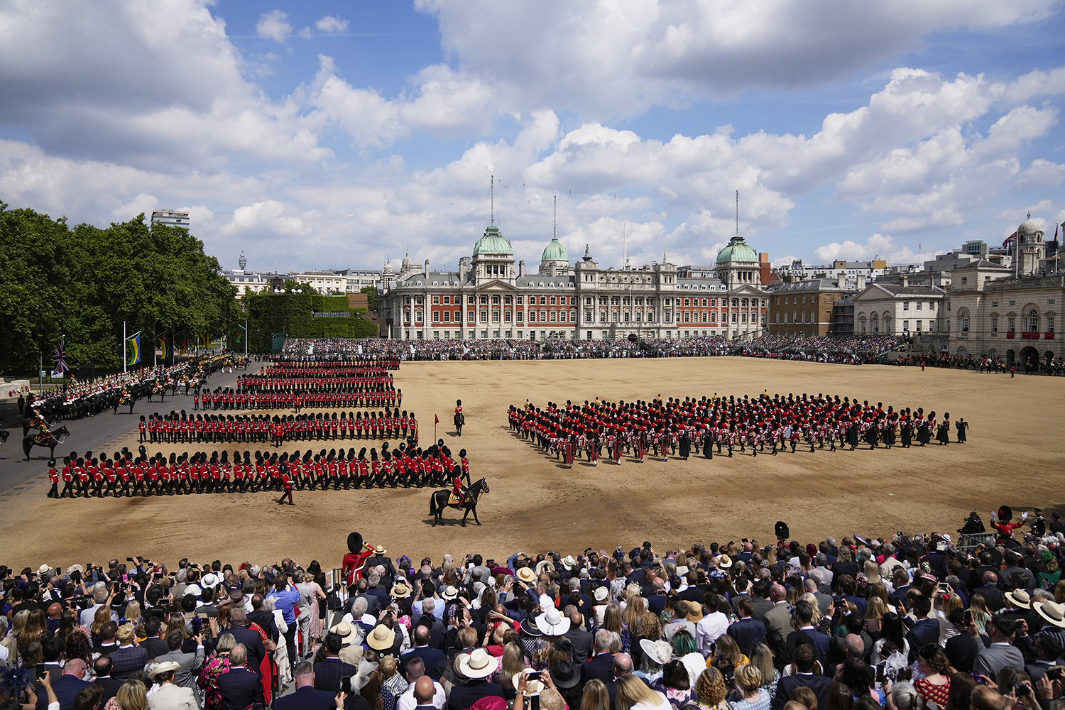 The Queen's guards march during the Trooping the Color parade at Horse Guards, London, Thursday, June 2, 2022, on the first of four days of celebrations to mark the Platinum Jubilee. The events over a long holiday weekend in the U.K. are meant to celebrate the monarch's 70 years of service.(AP Photo/Matt Dunham)