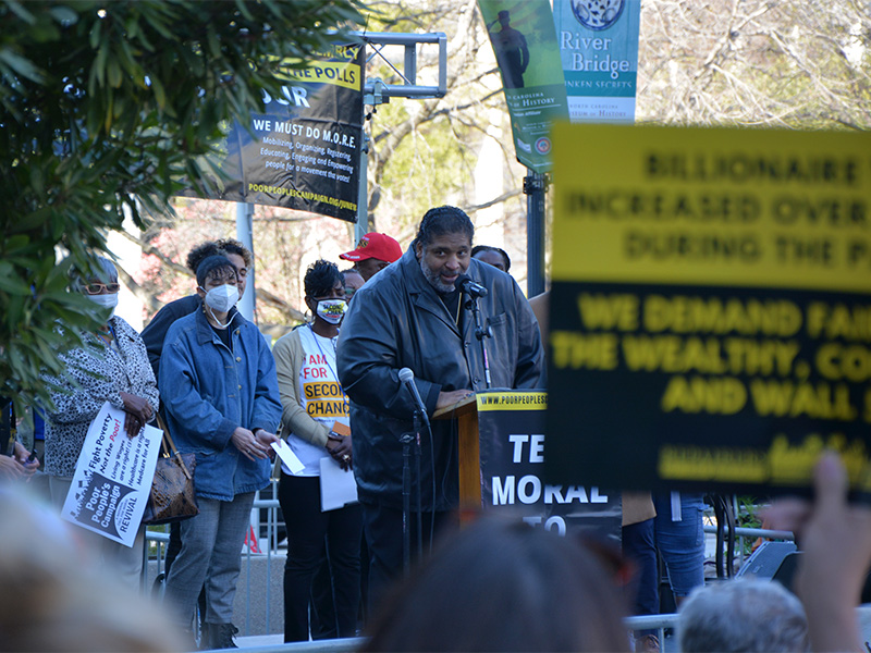The Rev. William Barber II speaks at a Poor People’s Campaign event near the state house in Raleigh, North Carolina, Monday, March 28, 2022. RNS photo by Jack Jenkins