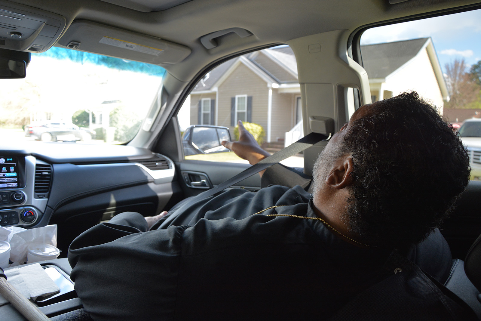 The Rev. William Barber II points out locations while driving around Goldsboro, North Carolina, Saturday, March 26, 2022. RNS photo by Jack Jenkins