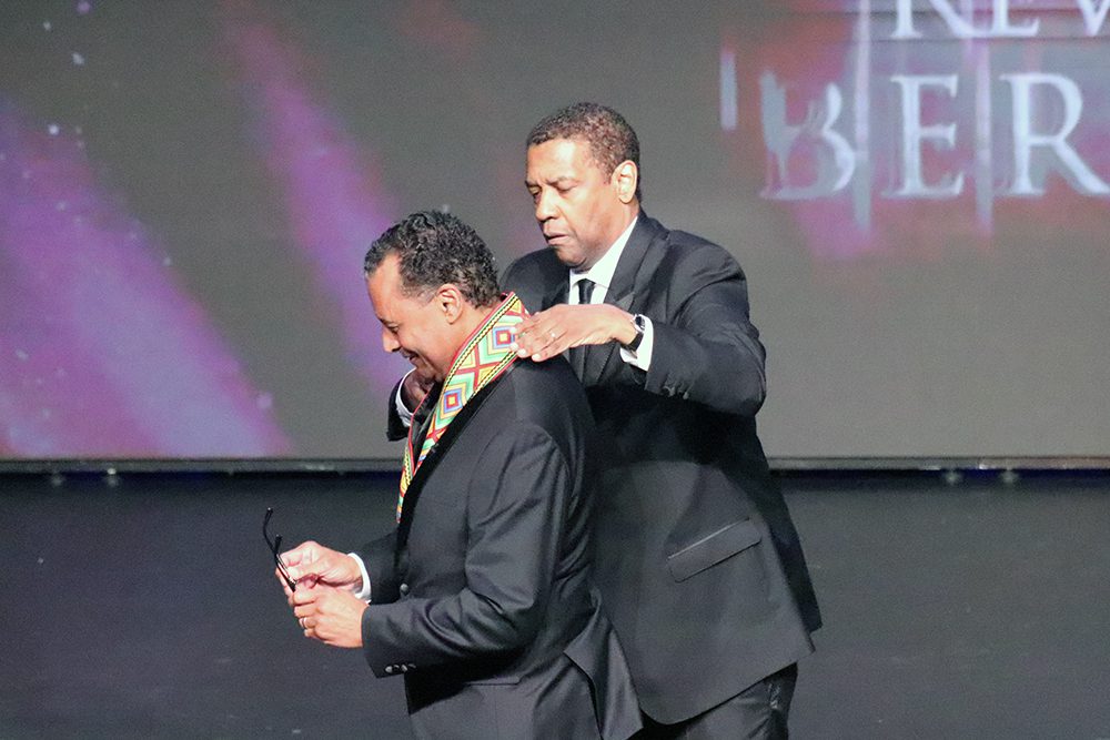 Denzel Washington, right, places a medal on honoree Pastor A.R. Bernard during the "Blessing of the Elders” awards ceremony at the Museum of the Bible, Thursday, June 23, 2022, in Washington. RNS photo by Adelle M. Banks