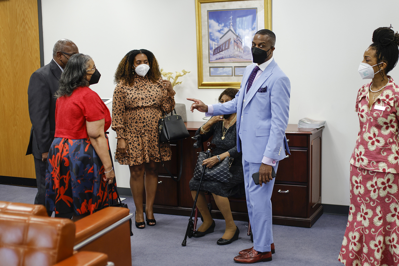 Rev. Dante Quick, speaks with worshipers after preaching during a church service at the First Baptist Church of Lincoln Gardens on Sunday, May 22, 2022, in Somerset, N.J. (AP Photo/Eduardo Munoz Alvarez)