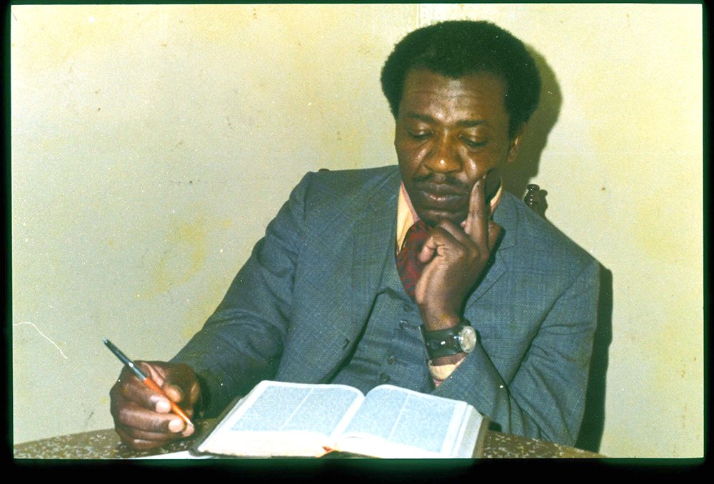 John Perkins reads the Bible in 1975. Photo courtesy of the John and Vera Mae Perkins Foundation