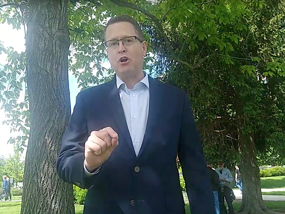 Pastor Matt Shea records a video in Coeur d’Alene, Idaho, shortly after members of a white nationalist group were arrested. Video screen grab