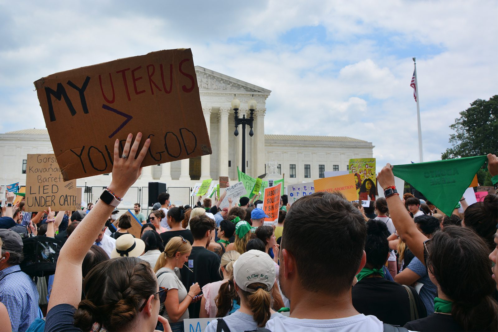 People gather outside the Supreme Court building in Washington, Friday, June 24, 2022, following the Supreme Court's decision to overturn Roe v. Wade, the federally protected right to abortion. RNS photo by Jack Jenkins