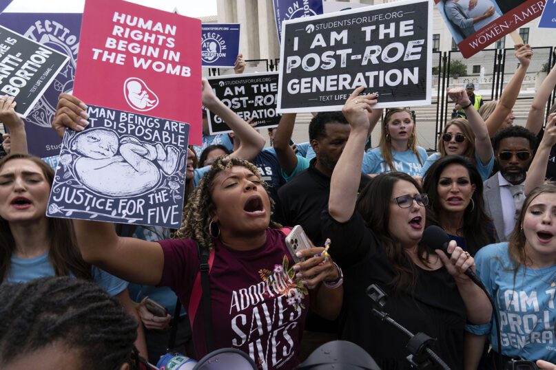 Anti-abortion protesters gather outside the Supreme Court in Washington, Friday, June 24, 2022. The Supreme Court has ended constitutional protections for abortion that had been in place nearly 50 years, a decision by its conservative majority to overturn the court's landmark abortion cases. (AP Photo/Jose Luis Magana)
