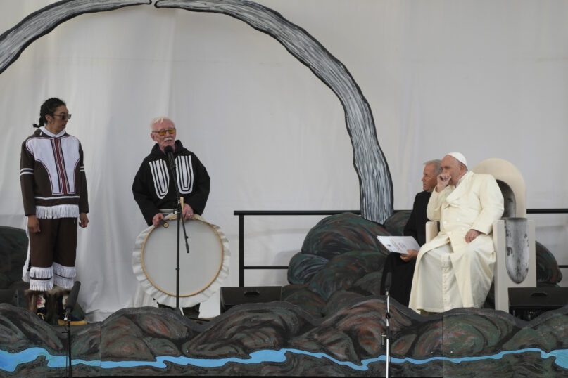 Pope Francis meets young people and elders at Nakasuk Elementary School Square in Iqaluit, Canada, Friday, July 29, 2022. Pope Francis travels to chilly Iqaluit, capital of northern Nunavut, to meet with Inuit Indigenous people, including school children and survivors of residential schools, in his final day in Canada. (AP Photo/Gregorio Borgia)
