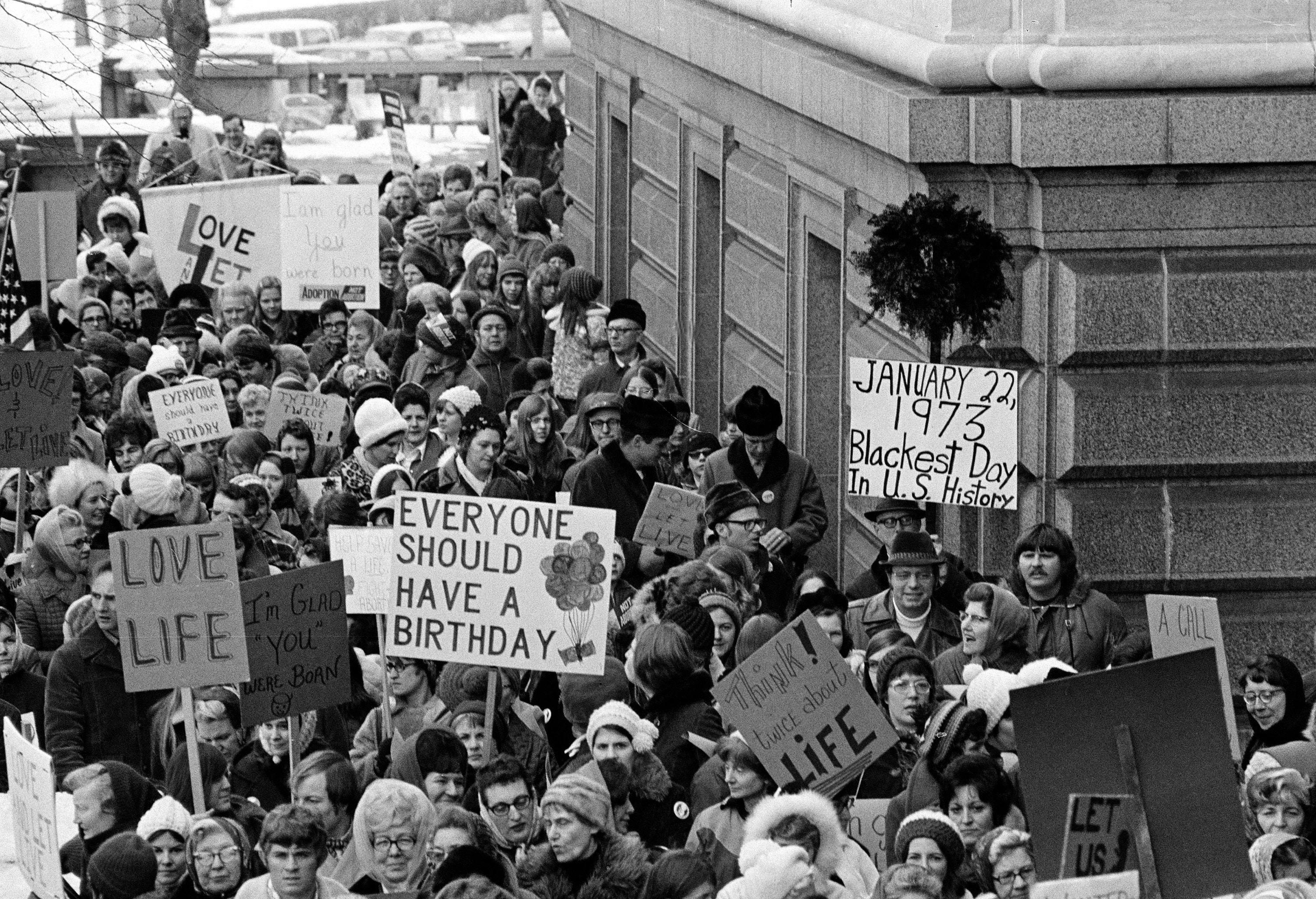A 1973 photo shows an estimated 5,000 people, women and men, marching around the Minnesota Capitol building protesting the U.S. Supreme Court's Roe v. Wade decision. (AP Photo)
