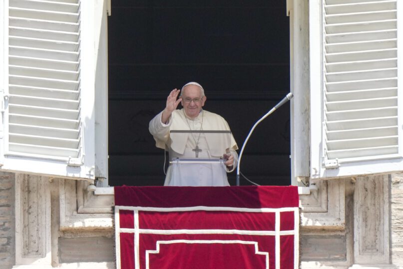 Pope Francis recites the Angelus noon prayer from the window of his studio overlooking St. Peter’s Square, at the Vatican, July 3, 2022. (AP Photo/Andrew Medichini)