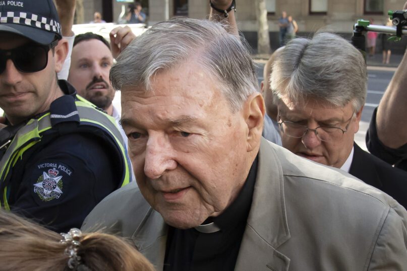 Cardinal George Pell arrives at the County Court in Melbourne, Australia, on Feb. 27, 2019. The father of a deceased former choirboy filed a lawsuit against Pell and the Catholic Church in an Australian court on July 14, 2022, claiming the parent suffered psychological injury over an accusation that the once-senior Vatican official sexually abused the son. (AP Photo/Andy Brownbill, File)