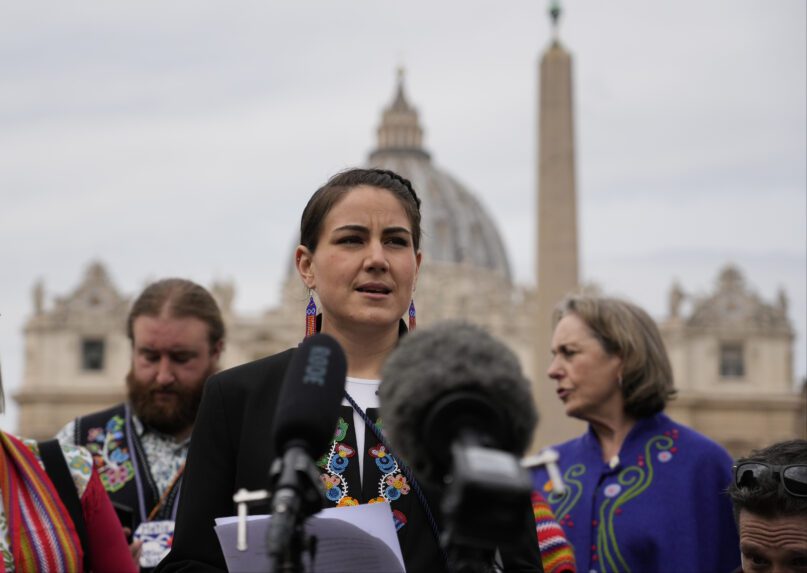 FILE - President of the Metis community, Cassidy Caron, speaks to the media in St. Peter's Square after their meeting with Pope Francis at The Vatican, Monday, March 28, 2022. The restitution of Indigenous and colonial-era artifacts, a pressing debate for museums and national collections across Europe, is one of the many agenda items awaiting Francis on his trip to Canada, which begins Sunday.  (AP Photo/Gregorio Borgia, File )