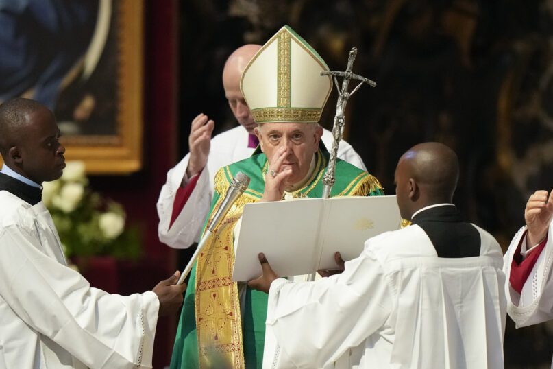 Pope Francis delivers his blessing at the end of a Mass for the Congolese community in St. Peter’s Basilica, at the Vatican, July 3, 2022. (AP Photo/Andrew Medichini)