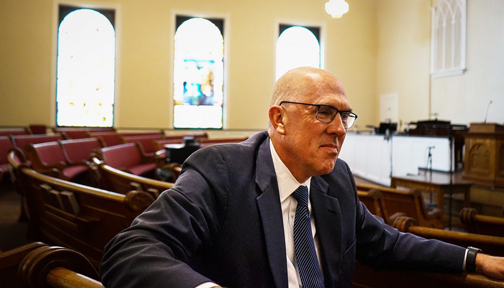 Bart Barber sits in a pew after a service on July 17, 2022, in First Baptist Church of Farmersville in rural northeast Texas, near Dallas. RNS photo by Riley Farrell