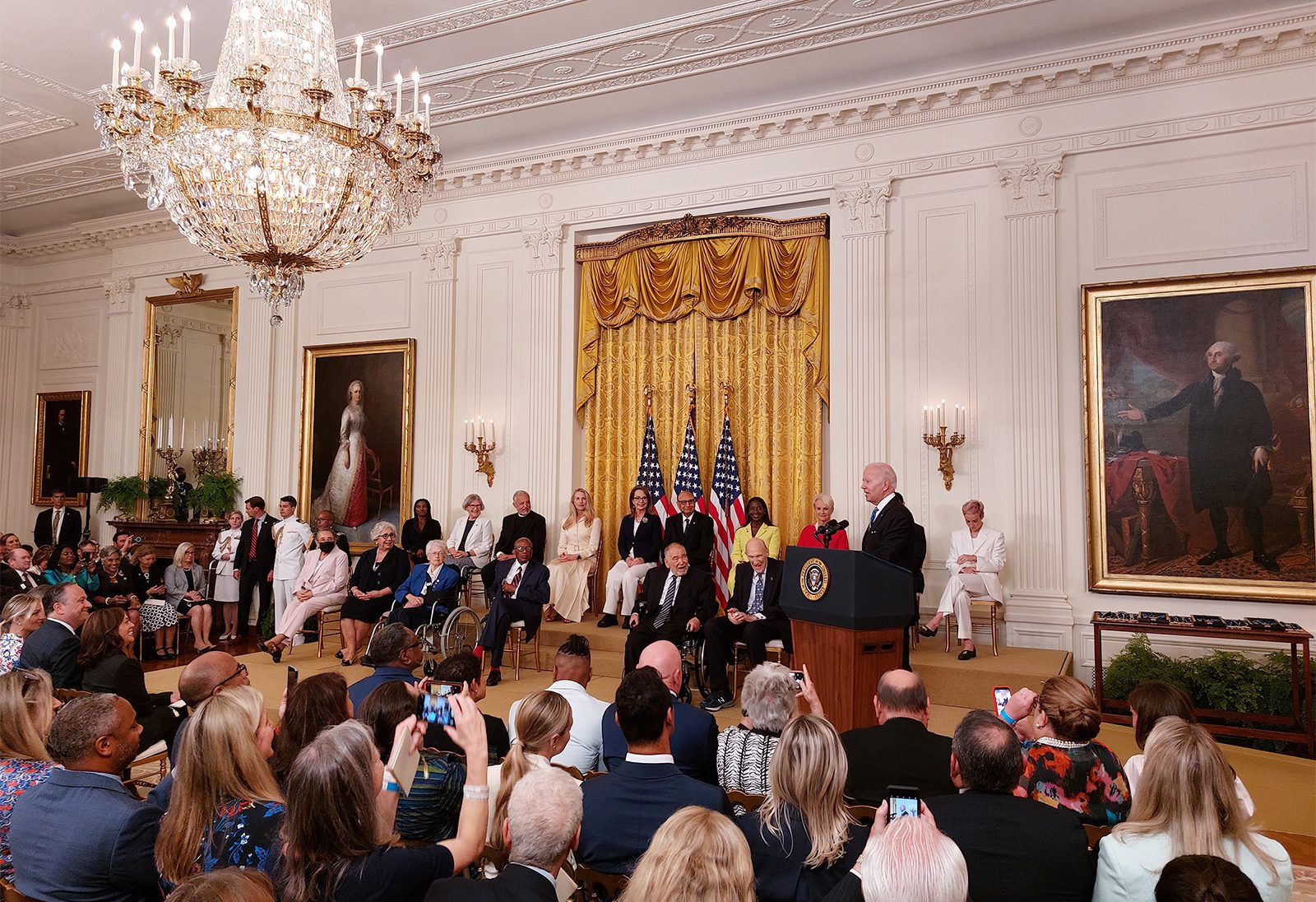 President Joe Biden, at podium, speaks before he awards the Presidential Medal of Freedom to honorees at the White House in Washington, Thursday, July 7, 2022. RNS photo by Adelle M. Banks