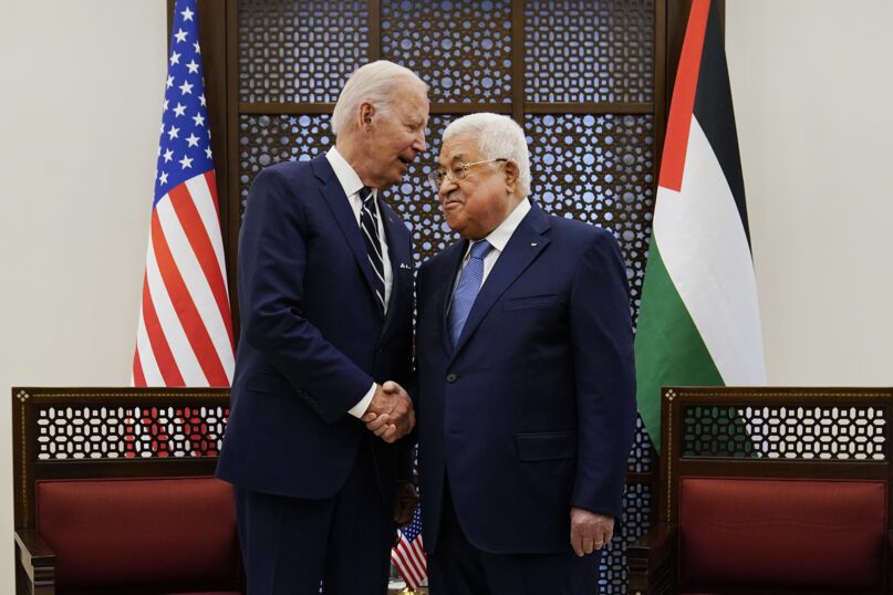 U.S. President Joe Biden shakes hands with Palestinian President Mahmoud Abbas in the West Bank town of Bethlehem, Friday, July 15, 2022. (AP Photo/Evan Vucci)