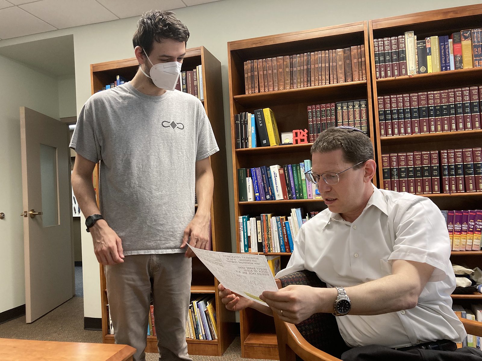 Rabbi Charlie Cytron Walker, right, speaks with Ben Breakstone, engagement and media coordinator, atTemple Emanuel in Winston-Salem, North Carolina, July 13, 2022. RNS photo by Yonat Shimron