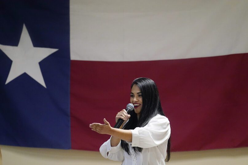 In this Sept. 22, 2021, file photo, Republican congressional candidate Mayra Flores speaks at a Cameron County Conservatives event in Harlingen, Texas. Flores argues that Democrats are forcing Texans to choose between their energy sector jobs and curbing climate change. (AP Photo/Eric Gay)