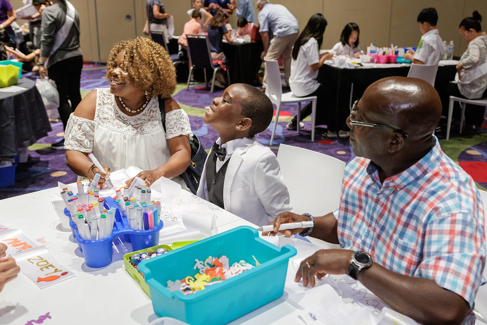 Families participate in activities during the CatholicHOM session of the Eucharistic Congress, June 18, 2022, at the Georgia International Convention Center near Atlanta. Photo by Carlisle Kellam
