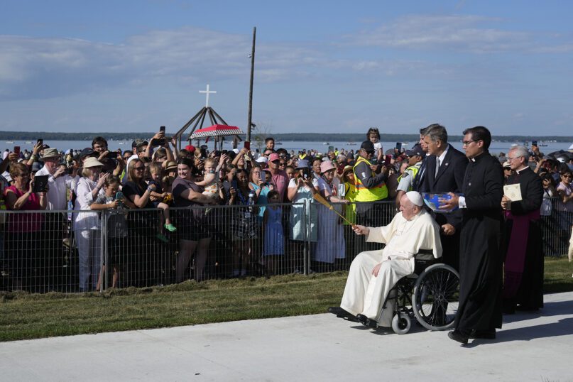 Pope Francis blesses faithfuls as he arrives at the Lac Ste. Anne pilgrimage site in Alberta, Canada, Tuesday, July 26, 2022. Pope Francis is on a second day of a 
