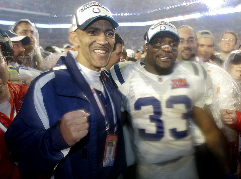 Indianapolis Colts coach Tony Dungy, left, and Colts' Dominic Rhodes (33) celebrate after the Colts defeated the Chicago Bears 29-17 in the Super Bowl XLI football game at Dolphin Stadium in Miami on Sunday, Feb. 4, 2007. (AP Photo/Amy Sancetta)