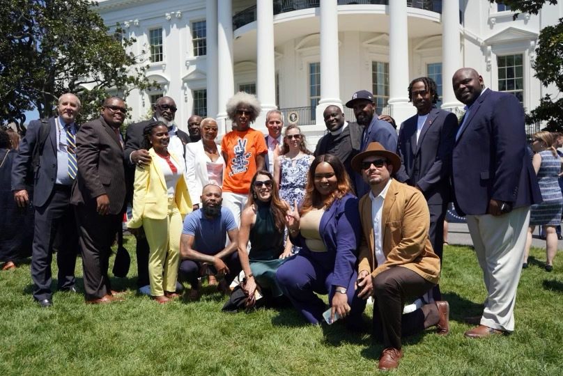 Members of the FUND PEACE Coalition gather after President Joe Biden signed the Bipartisan Safer Communties Act at the White House, Monday, July 11, 2022. Photo by Bill Lee
