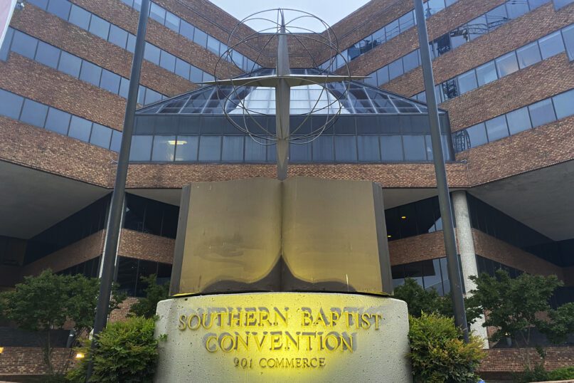 A cross and Bible sculpture stand outside the Southern Baptist Convention headquarters in Nashville, Tennessee, on May 24, 2022. The Executive Committee of the Southern Baptist Convention said Aug. 12, 2022, that several of the denomination’s major entities are under investigation by the U.S. Department of Justice. (AP Photo/Holly Meyer, File)