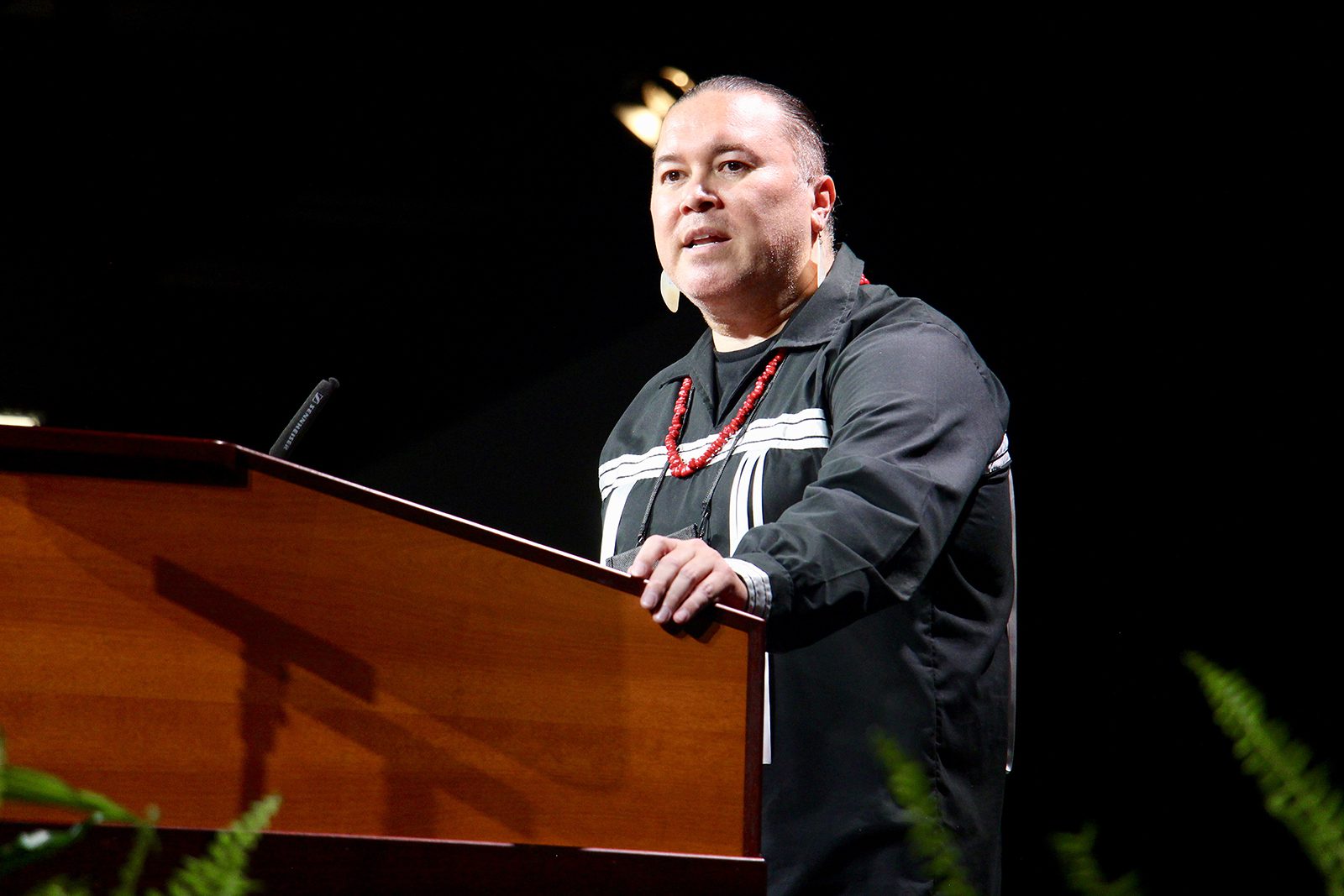 Vance Blackfox, director for Indigenous ministries and tribal relations for the Evangelical Lutheran Church in America, addresses the ELCA Churchwide Assembly, Aug. 10, 2022, in Columbus, Ohio. RNS photo by Emily McFarlan Miller