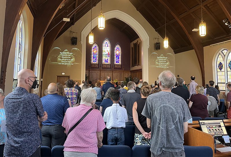 Congregants sing during the final service at Grace Evangelical Covenant Church on Sunday, Aug. 28, 2022, in Chicago. RNS photo by Bob Smietana