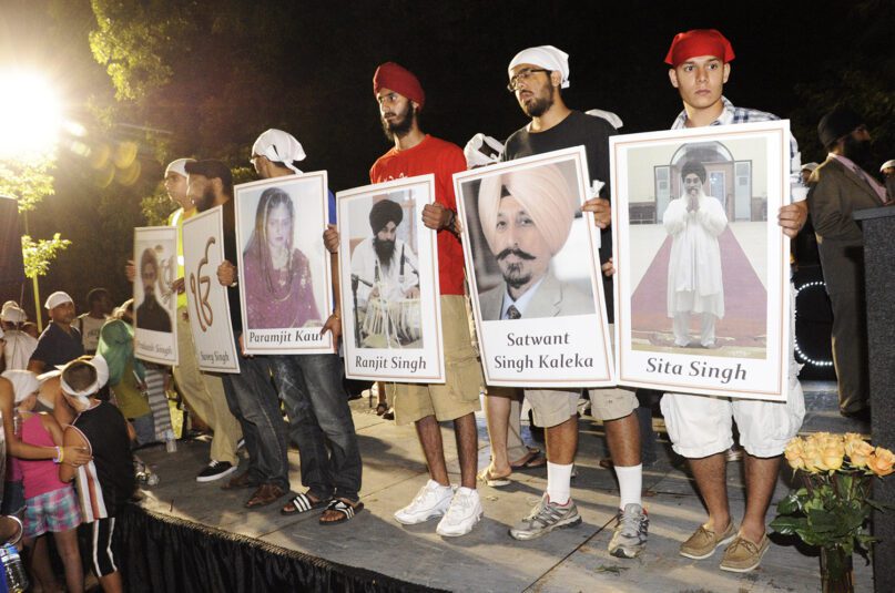 Large portraits of the Oak Creek Sikh Temple shooting victims were on display during a vigil held on Tuesday, Aug. 7, 2012. Photo by Ernie Mastroianni photo, courtesy of Sikh Coalition