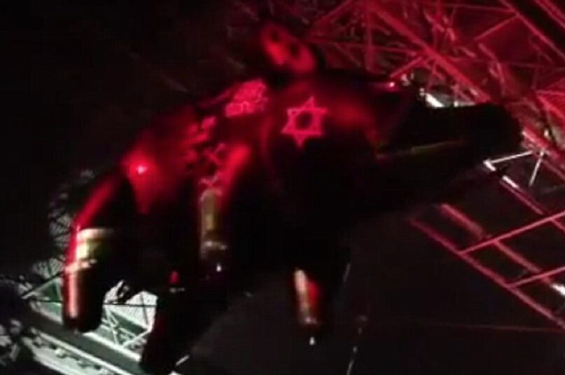 An inflatable pig, adorned with the Star of David, that appeared at a Roger Waters concert in 2013. Video screen grab