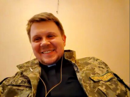 Fr. Sergiy Berezhnoy smiles during a RNS zoom interview. Zoom screengrab